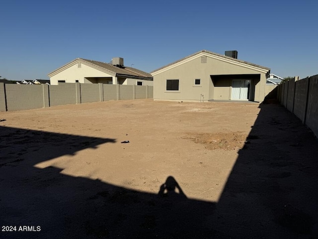 view of yard featuring central air condition unit