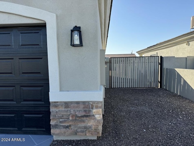 view of side of property featuring a garage