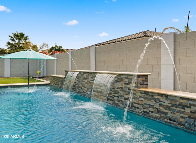 view of pool featuring pool water feature