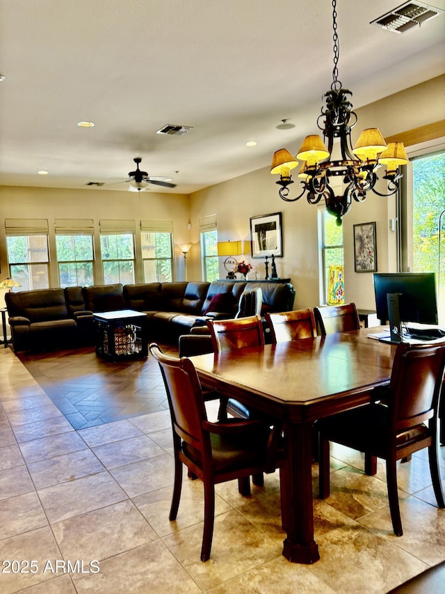 9249 E Desert Arroyos St, Scottsdale, AZ 85255 - dining room featuring a chandelier, ceiling fan, and recessed lighting