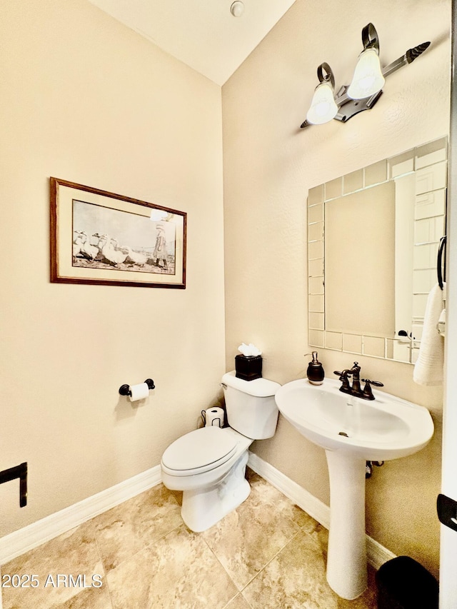 9249 E Desert Arroyos St, Scottsdale, AZ 85255 - bathroom with toilet, baseboards, and tile patterned flooring