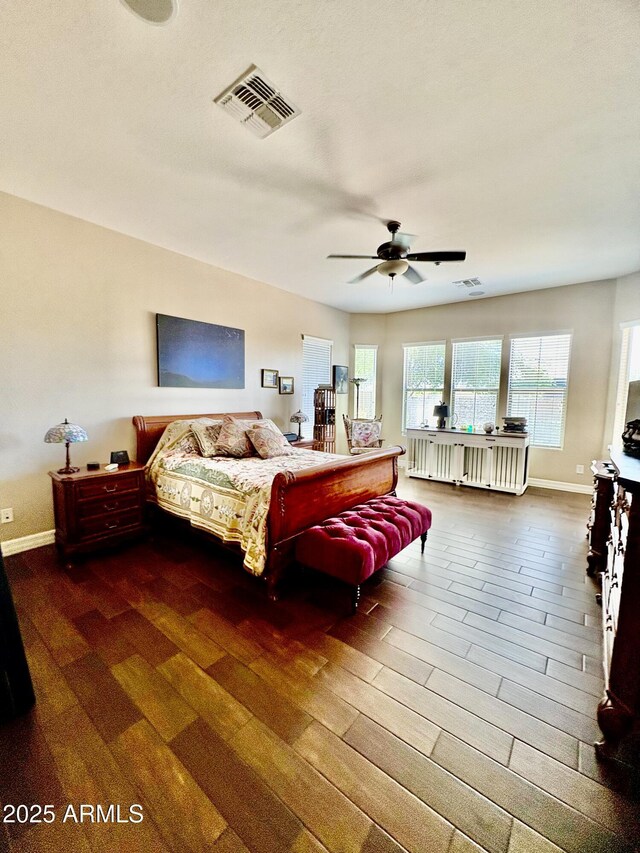 9249 E Desert Arroyos St, Scottsdale, AZ 85255 - bedroom featuring wood finished floors, baseboards, and ceiling fan