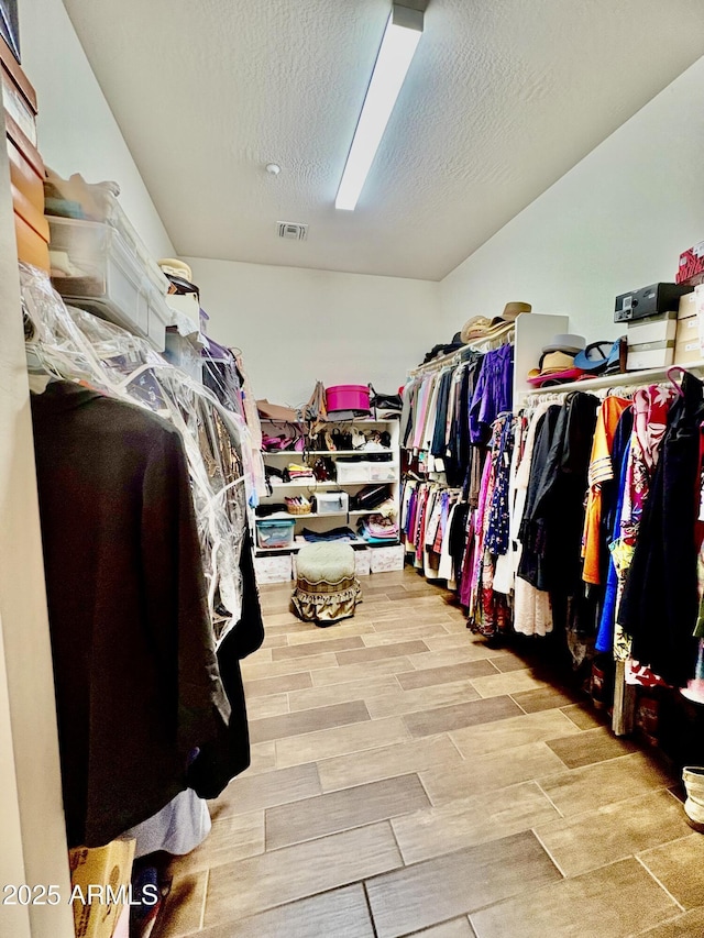 9249 E Desert Arroyos St, Scottsdale, AZ 85255 - spacious closet with wood finish floors