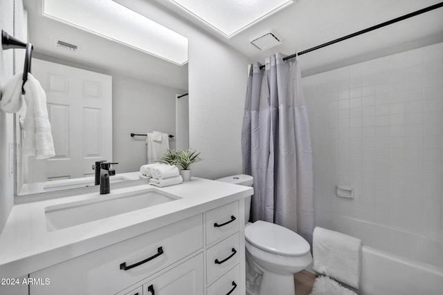 full bathroom with toilet, vanity, hardwood / wood-style flooring, and shower / tub combo with curtain