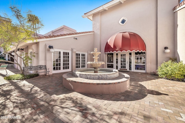 view of patio featuring french doors