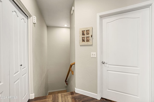 hall with dark parquet floors