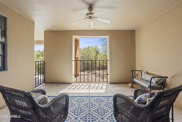 view of patio featuring ceiling fan