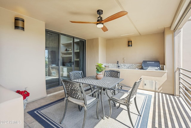 view of patio featuring ceiling fan