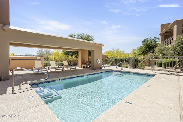 view of pool featuring a patio