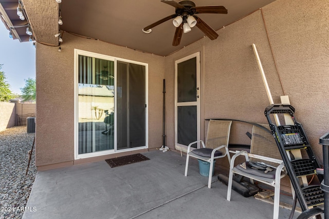 view of patio / terrace featuring ceiling fan and central air condition unit