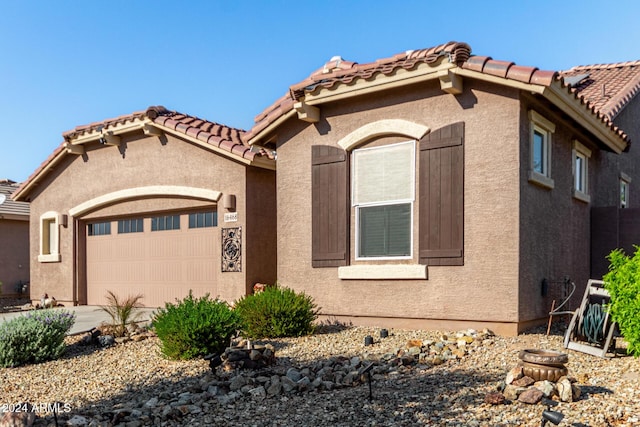 view of front of house with a garage