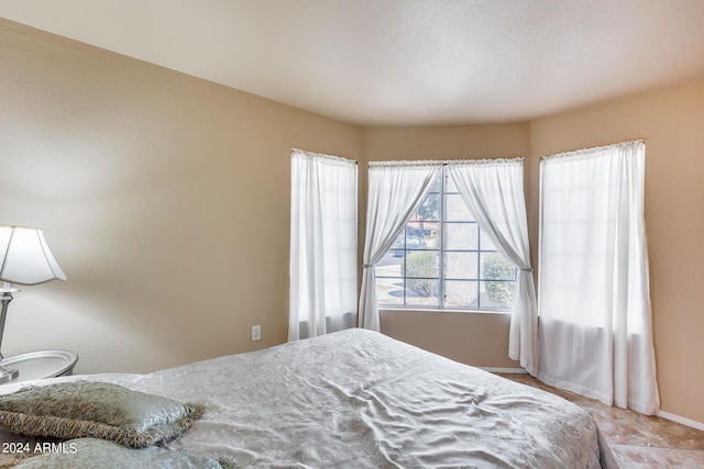 bedroom with baseboards