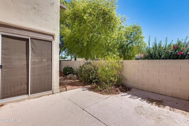 view of patio with fence