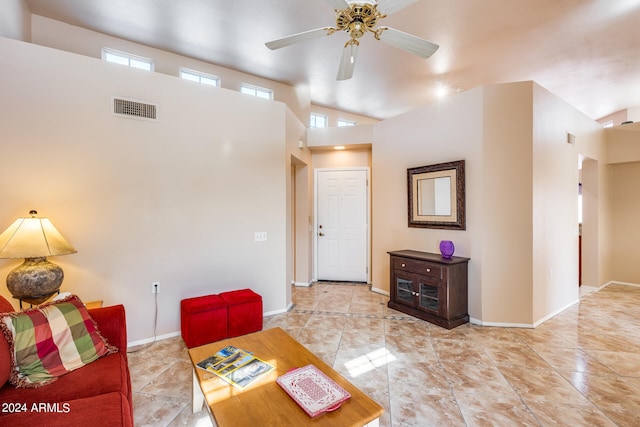 living room featuring ceiling fan and high vaulted ceiling