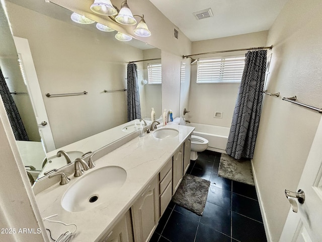 full bathroom with shower / tub combo, vanity, toilet, and tile patterned floors