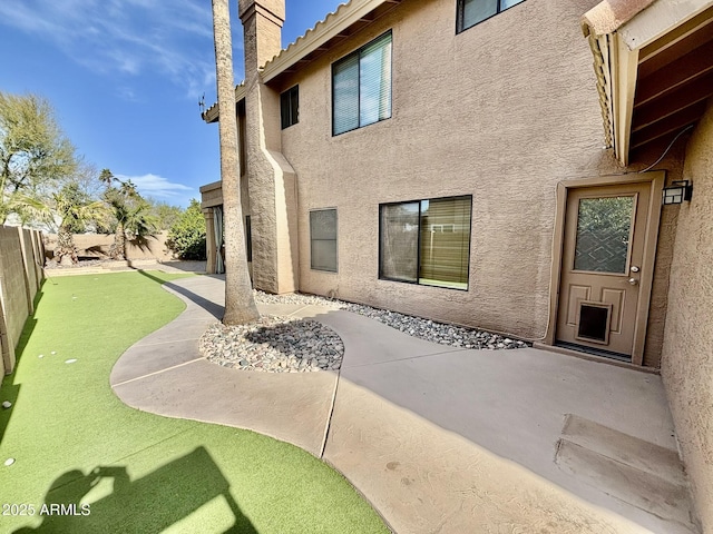 rear view of house featuring a patio area