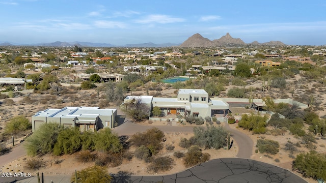 birds eye view of property featuring a mountain view