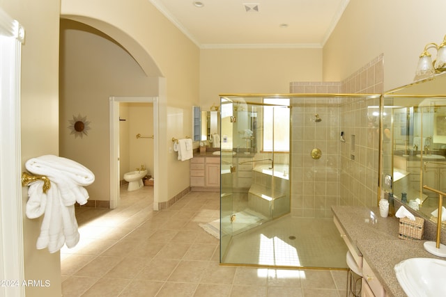 bathroom with tile patterned flooring, plus walk in shower, a bidet, and vanity