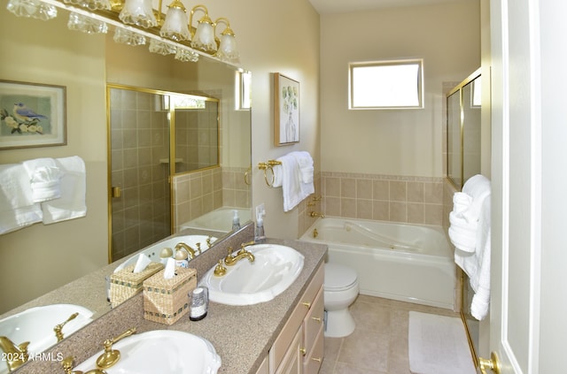 full bathroom featuring independent shower and bath, tile patterned flooring, toilet, and dual bowl vanity