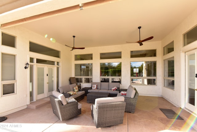 view of patio / terrace featuring ceiling fan, french doors, and outdoor lounge area