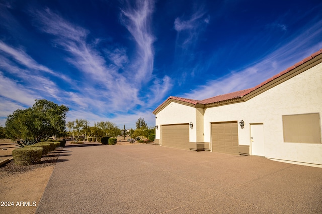 exterior space featuring a garage