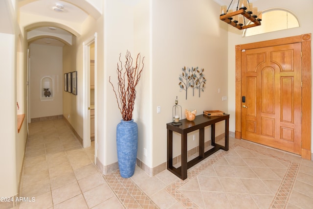 entryway with light tile patterned floors