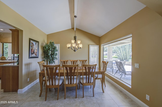 dining space with a chandelier, healthy amount of natural light, baseboards, and light tile patterned floors