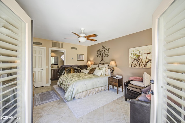 bedroom with light tile patterned flooring