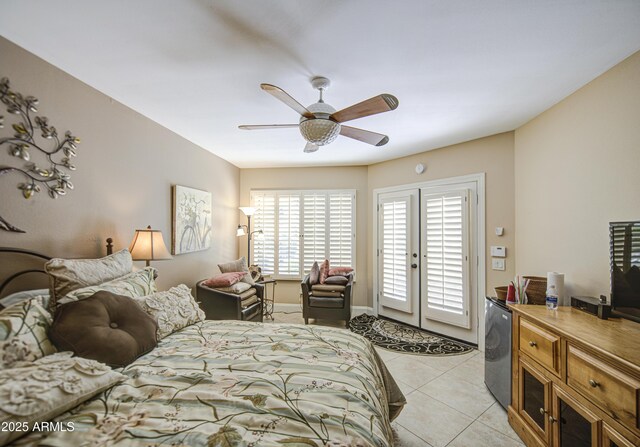 bedroom with access to exterior, light tile patterned floors, ceiling fan, and fridge