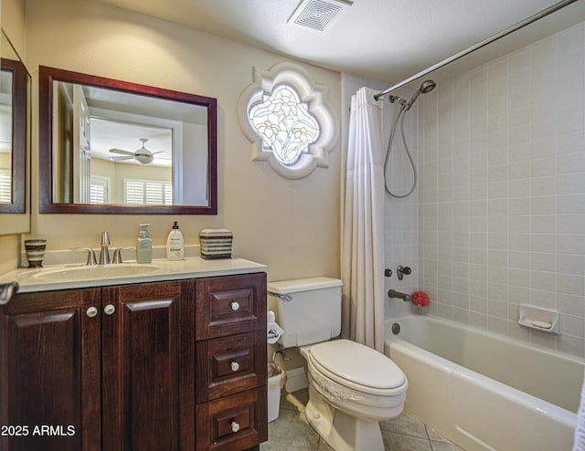 full bath with tile patterned floors, toilet, shower / bath combination with curtain, and vanity