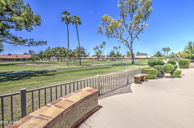 surrounding community with a yard