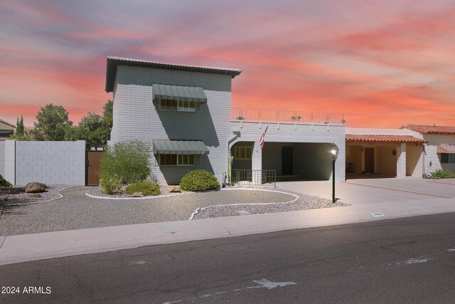 yard at dusk with a patio and outdoor lounge area