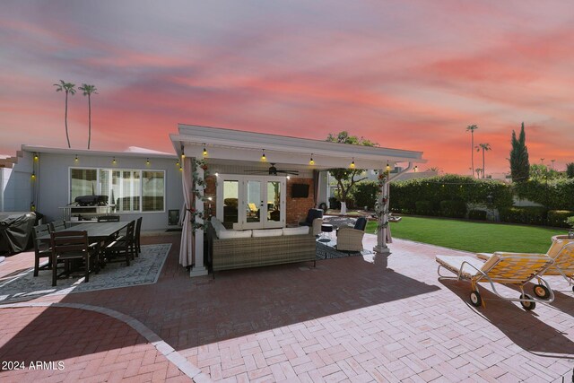 exterior space featuring outdoor lounge area and french doors