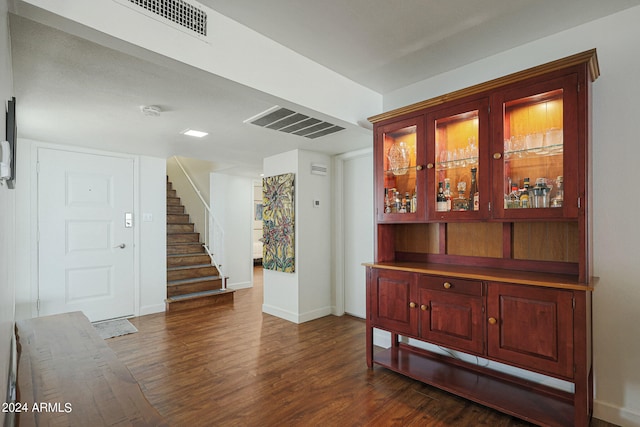 interior space with dark wood-type flooring