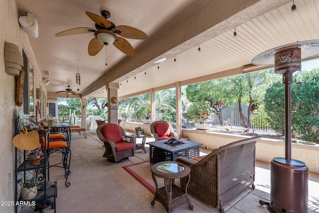 view of patio / terrace with outdoor lounge area, fence, a ceiling fan, visible vents, and outdoor dining space