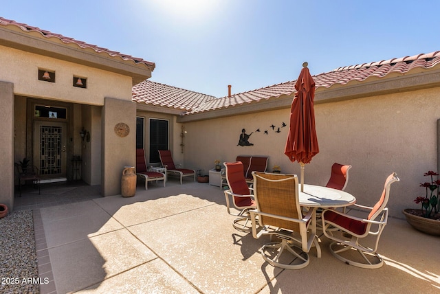 view of patio featuring outdoor dining space
