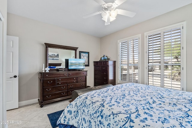 bedroom with tile patterned floors, access to outside, baseboards, and a ceiling fan