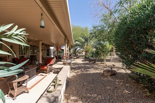 view of yard featuring a patio area and fence