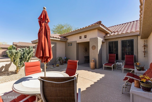 view of patio featuring outdoor dining space