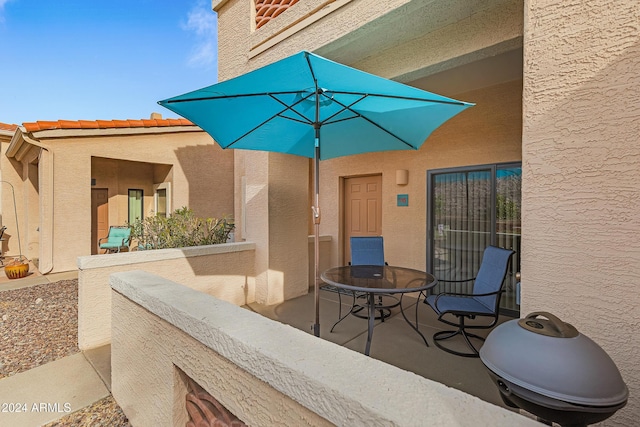 view of patio / terrace with a balcony