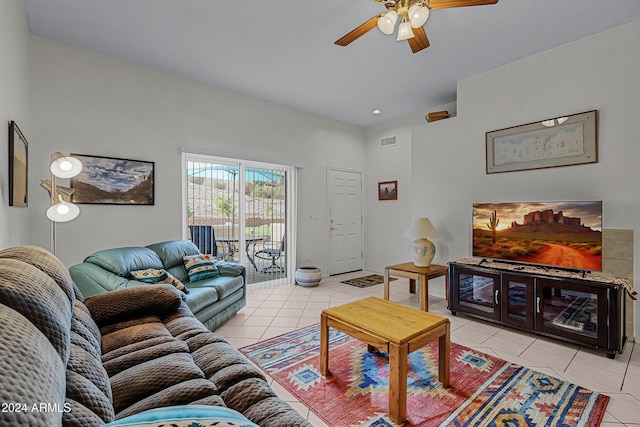 living room with ceiling fan and light tile patterned floors