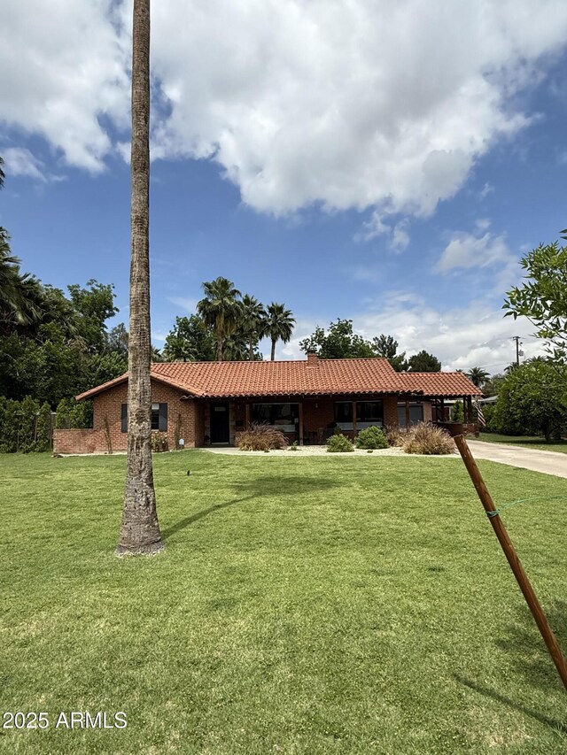 20 W Pasadena Ave, Phoenix, AZ 85013 - single story home with a front yard and metal roof