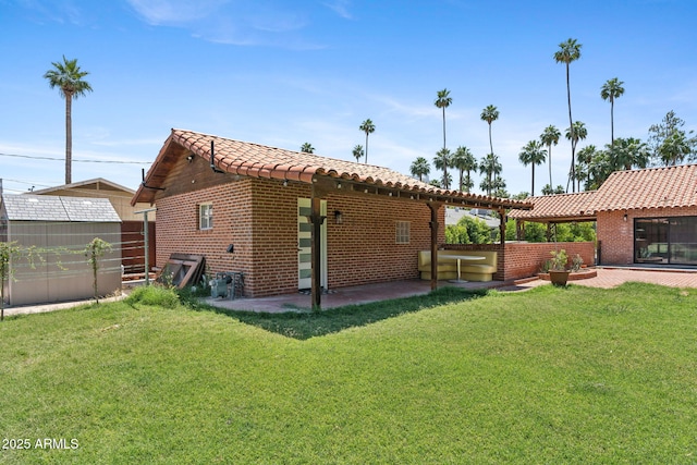 20 W Pasadena Ave, Phoenix, AZ 85013 - rear view of house featuring a patio, a tile roof, and an outdoor structure