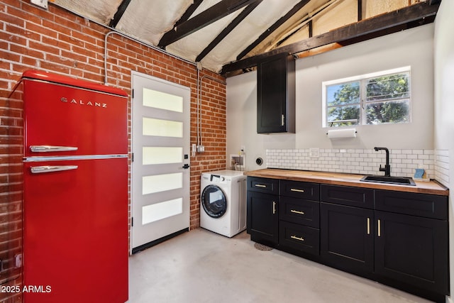 20 W Pasadena Ave, Phoenix, AZ 85013 - laundry room with washer / dryer, cabinet space, and brick wall