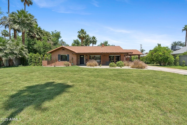 20 W Pasadena Ave, Phoenix, AZ 85013 - ranch-style house with a tile roof, a chimney, and a front lawn