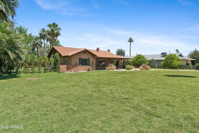 20 W Pasadena Ave, Phoenix, AZ 85013 - view of front of property featuring a chimney, a tiled roof, and brick siding
