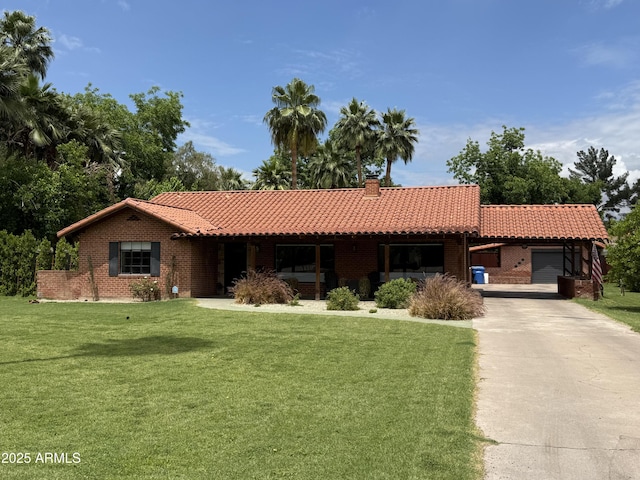 20 W Pasadena Ave, Phoenix, AZ 85013 - single story home featuring a tile roof, a front lawn, and a garage