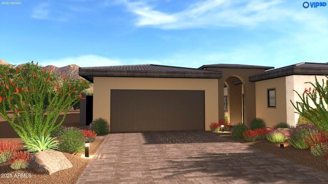 12326 E Black Rock Rd, Scottsdale, AZ 85255 - view of front facade featuring stucco siding, decorative driveway, and an attached garage