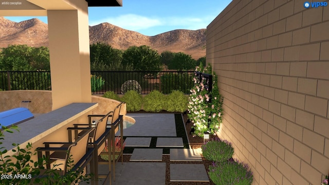 12326 E Black Rock Rd, Scottsdale, AZ 85255 - view of patio / terrace featuring outdoor dry bar, a mountain view, and fence