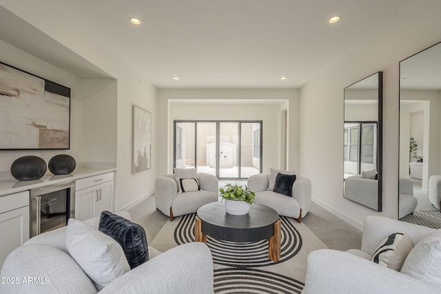 12326 E Black Rock Rd, Scottsdale, AZ 85255 - living area with wine cooler, light colored carpet, and recessed lighting